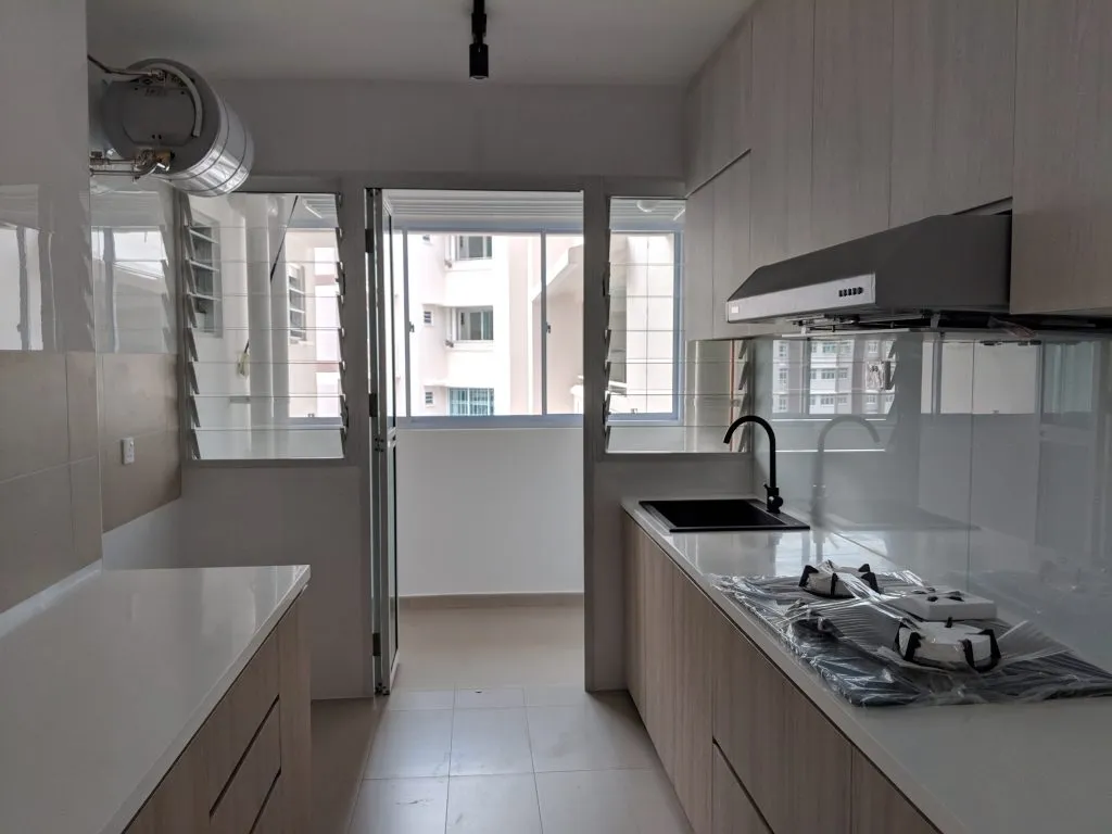 The kitchen with the work done, complete with the solid surface counter-top.