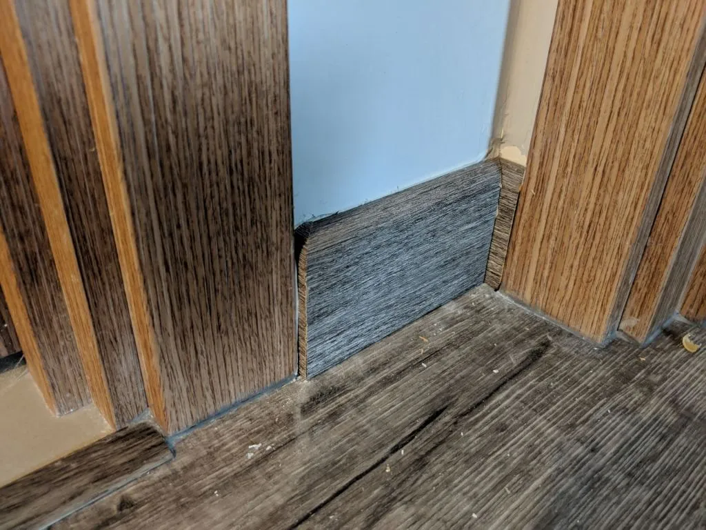 The measurements and cutting were very precise, as you can see from the tight way they were slotted in. Sadly some paint peeled while the job was being done, so we’ll need to eventually tape the skirting before painting over the hole on the wall paint.