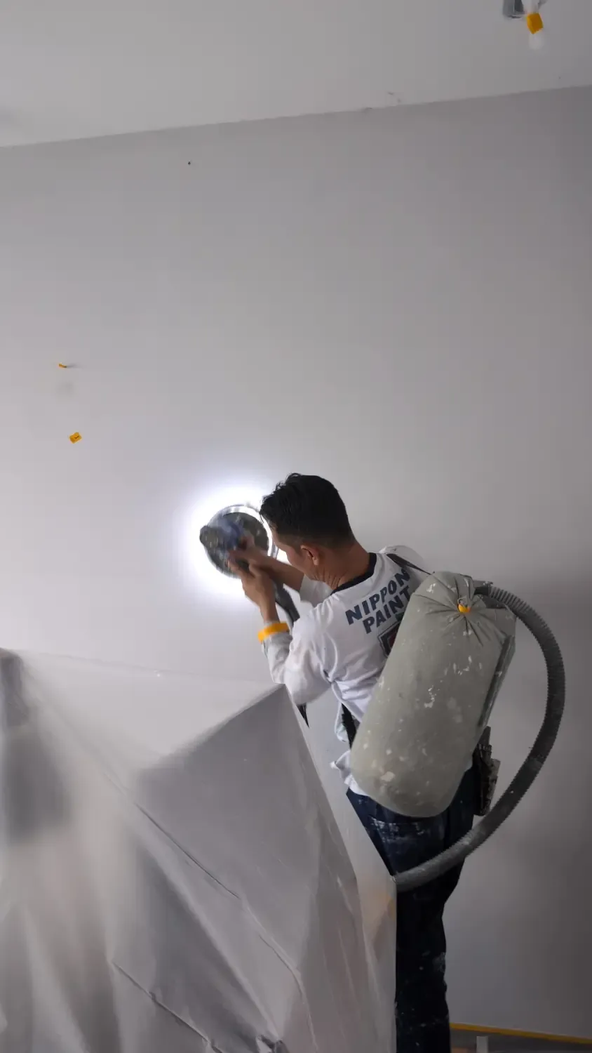 Sanding the walls