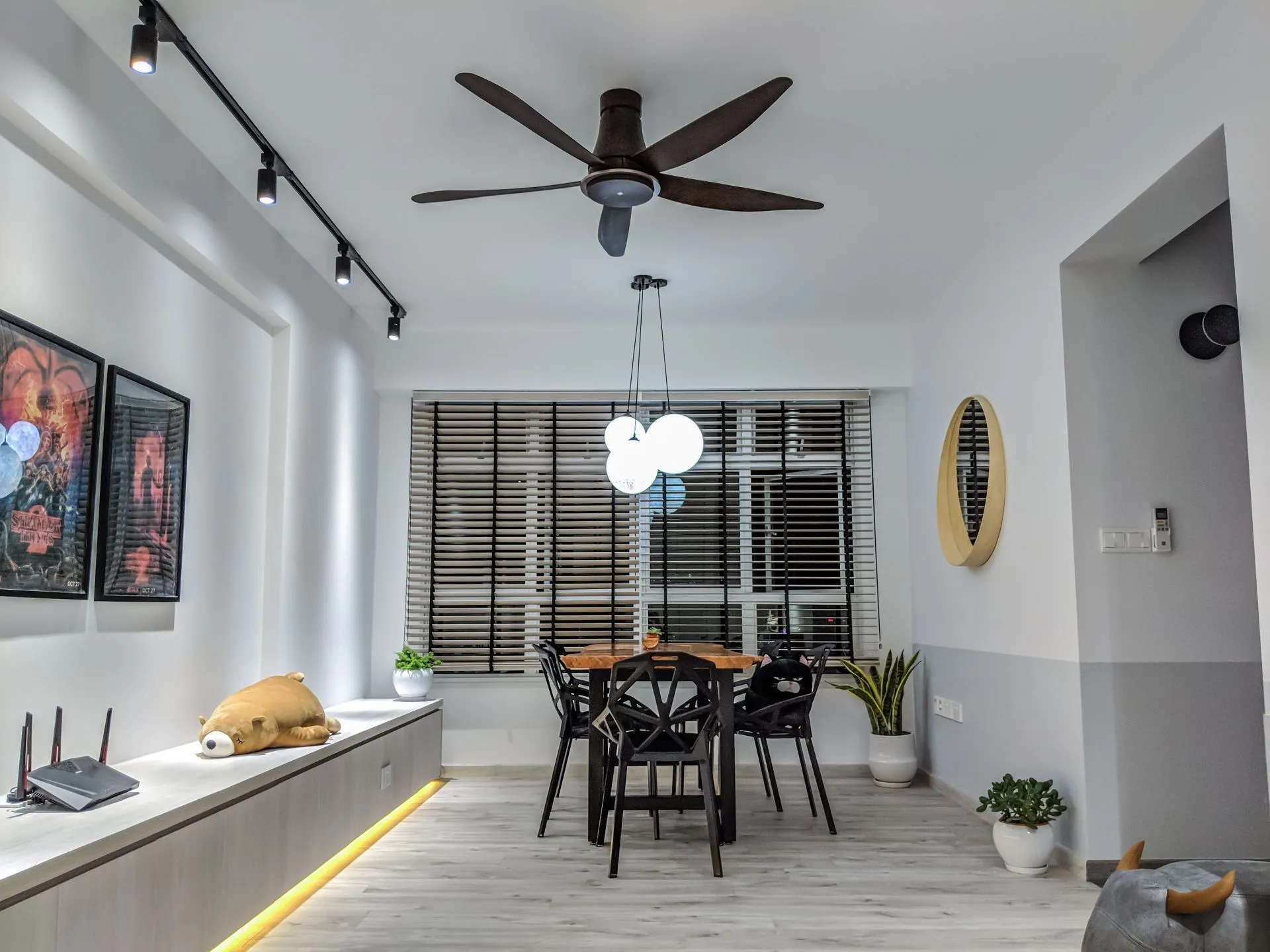 The living room. We don’t typically turn on all the lights, the LED lights beneath the settee isn’t really useful. It’s primarily for aesthetic purposes. The 60-inch ceiling fan fits quite well, we were originally concerned that it’d be too big. But it’s just right.