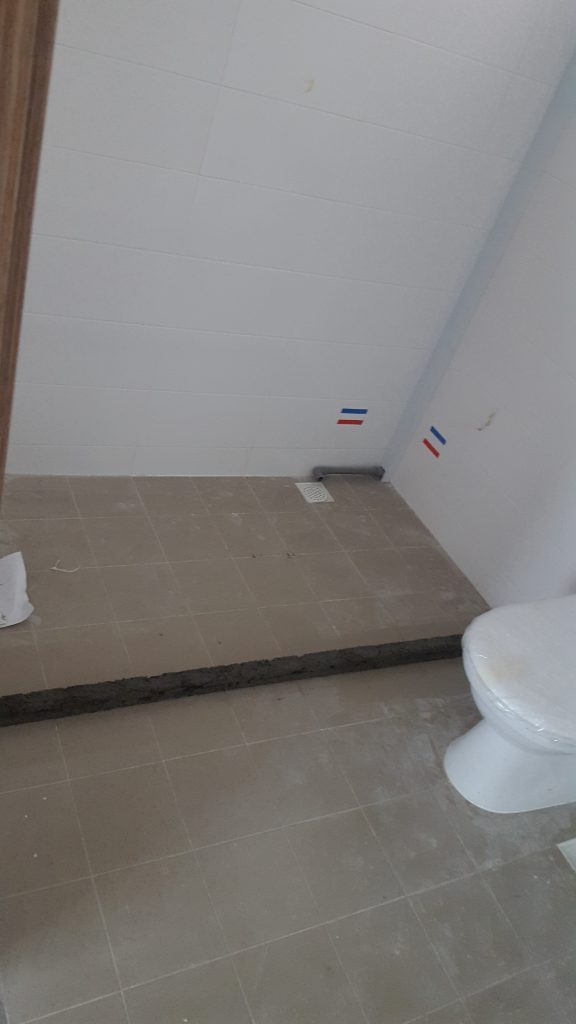 The kerb for the MBR toilet, which differs from the common toilet because it will accommodate a shower screen 