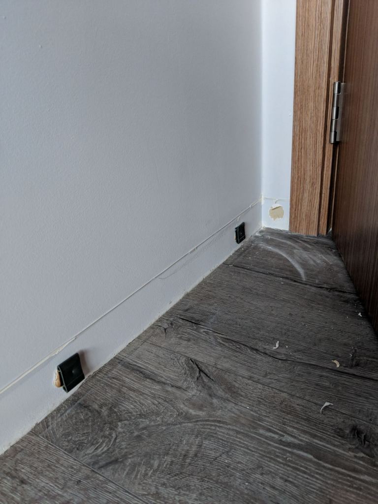 In case you're curious, the skirting is held upright by glue and hooks. Be prepared for a lot of dust all around though!